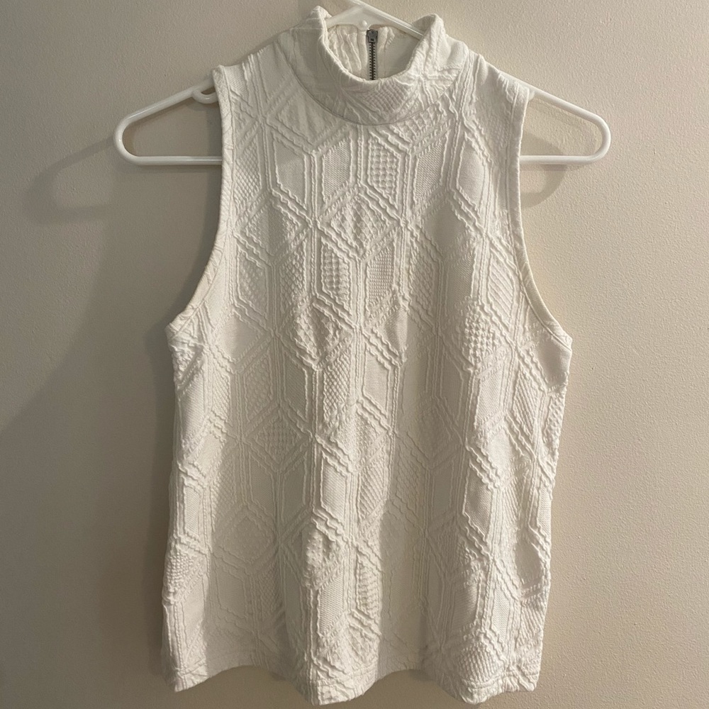 White geometric sleeveless top